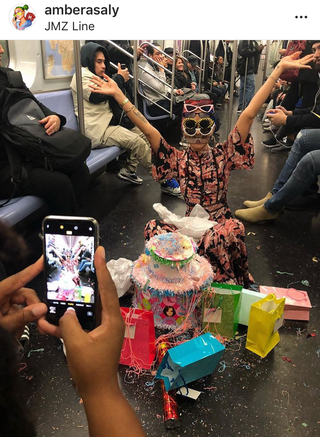 Illustration for article titled This Woman Threw a Birthday Party on a Subway Car and It Looks Really Fucking Annoying